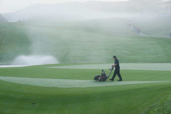 UNITED KINGDOM - OCTOBER 02: The greens keepers defrost the greens during the continuation of Friday's fourball matches at the 38th Ryder Cup at the Twenty Ten Course at Celtic Manor in Newport, Wales, on Saturday, October 2, 2010. (Photo by Montana Pritchard/PGA of America via Getty Images)